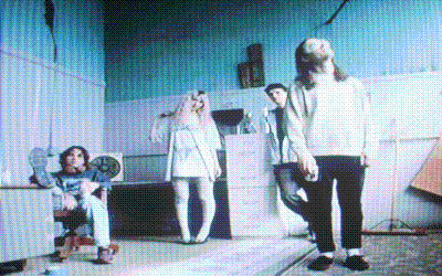 band in a blue room